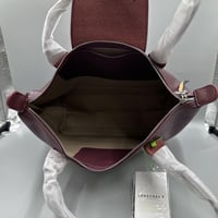 شنطة لونج شامب جلد عنابي