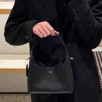 شنطة يد كوتش أسود