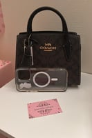 شنطة يد كوتش بني