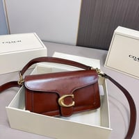 شنطة كوتش تابي لامع