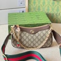 شنطة يد قوتشي