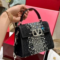 شنطة يد فالنتينو لامع