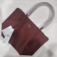 شنطة لاكوست فيس عنابي