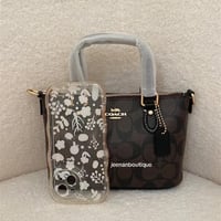 شنطة يد كوتش