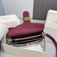 شنطة كوتش تابي لامع