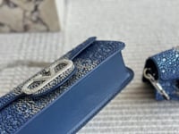 شنطة يد فالنتينو لامع