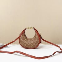 شنطة يد كوتش