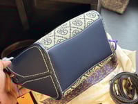 شنطة يد توري بورش