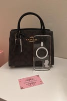 شنطة يد كوتش بني