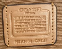 شنطة يد كوتش