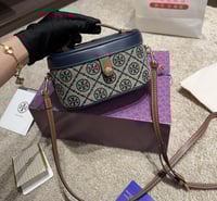 شنطة يد توري بورش