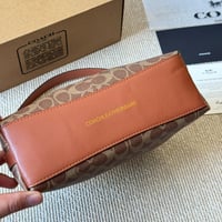 شنطة يد كوتش