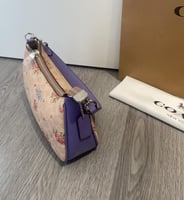 شنطة يد كوتش