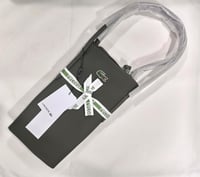 شنطة لاكوست فيس زيتي غامق