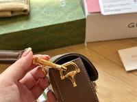 شنطة يد قوتشي