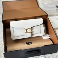 شنطة كوتش تابي أبيض