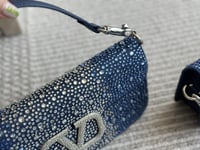 شنطة يد فالنتينو لامع