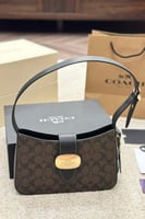 شنطة كتف كوتش بني