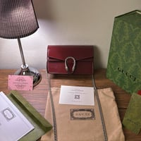 شنطة كتف قوتشي عنابي