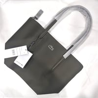 شنطة لاكوست فيس زيتي غامق