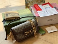 شنطة يد قوتشي