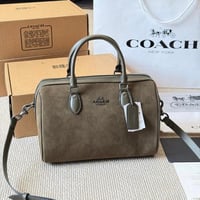 شنطة كوتش زيتي مخمل