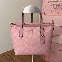 شنطة يد كوتش بيبي بينك