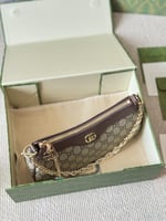 شنطة يد قوتشي