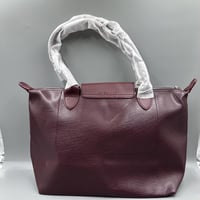 شنطة لونج شامب جلد عنابي