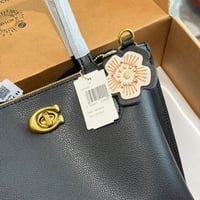 شنطة يد كوتش