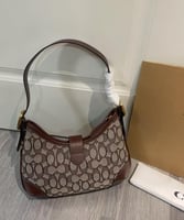 شنطة كتف كوتش