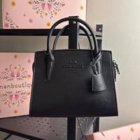 شنطة يد كوتش أسود