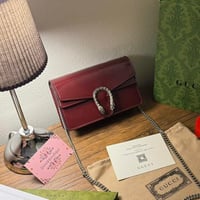 شنطة كتف قوتشي عنابي