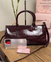 شنطة يد سي اتش جلد عنابي