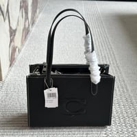 شنطة يد كوتش