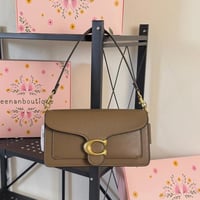 شنطة كوتش تابي بني غامق