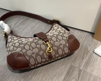 شنطة كتف كوتش