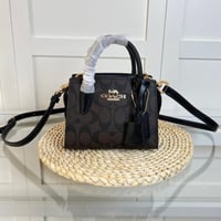 شنطة يد كوتش ميني