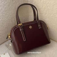 شنطة يد توري بورش مطفي