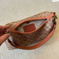 شنطة يد كوتش