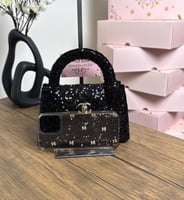 شنطة يد شانيل قليتر أسود