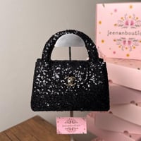 شنطة يد شانيل قليتر أسود