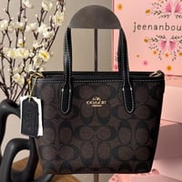 شنطة يد كوتش أسود