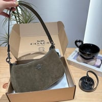 شنطة كوتش زيتي مخمل