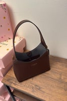 شنطة يد كوتش مديم