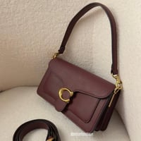 شنطة كوتش تابي عنابي