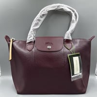 شنطة لونج شامب جلد عنابي