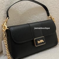 شنطة كتف كوتش