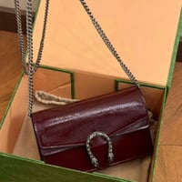 شنطة كتف قوتشي عنابي