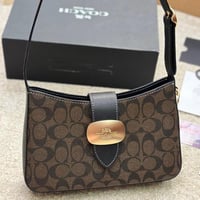 شنطة كتف كوتش بني